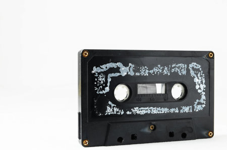 Ancient Vintage Used Musicassette over a White の写真素材