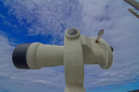 Coin Operated Telescope For Beach Observation, Blue Sky And Clouds