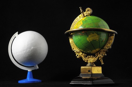 Many Globes Planet Earth on a Black Backgroundの写真素材