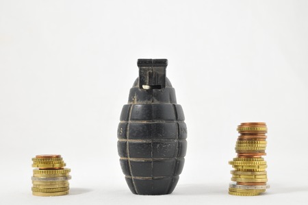 Money for War Concept Hand Grenade and Moneyの写真素材
