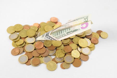 Flying Money Concept a Dollar Airplane and Coinsの写真素材