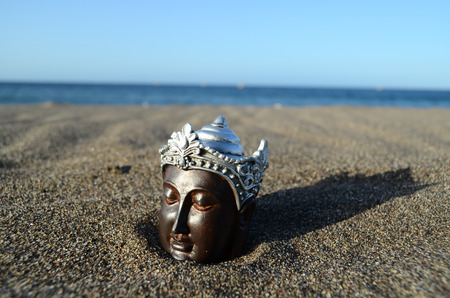 One Ancient Buddha Statue Near The Oceanの写真素材