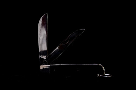 Vintage Black Knife Tool on a Dark の写真素材
