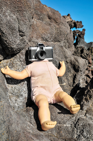 Old Vintage Doll with a Photo Camera Headの写真素材