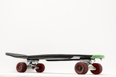 Vintage Style Black Skateboard on a white Backgroundの写真素材