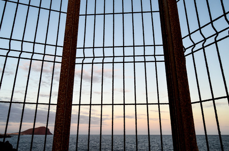 Net over the atlantic ocean at sunsetの写真素材