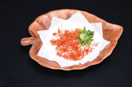 Saffron Flower Spice On a Black Backgroundの写真素材