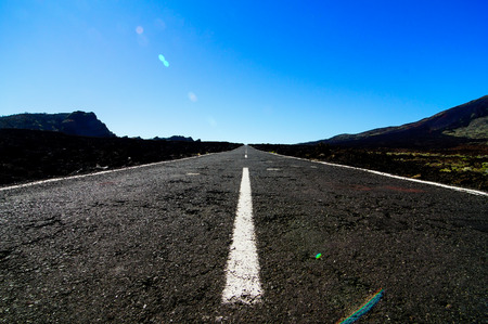 Long Empty Desert Asphalt Road in El Hierro Canary Islands Spainの写真素材