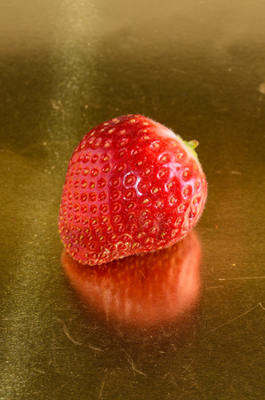 Fresh Ripe Strawberry Fruit on a Colored Backgroundの写真素材