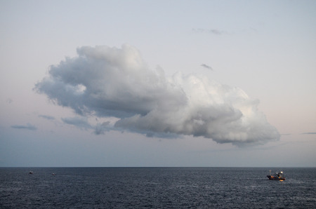 Cloudscape, Colored Clouds at Sunset near the Oceanの写真素材