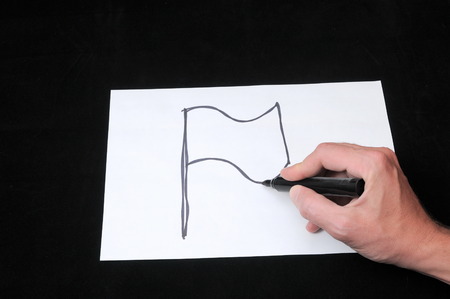 A Caucasian Male Hand Drawing on a White Paperの写真素材