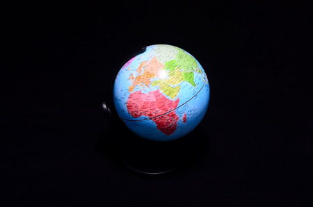 Globe Planet Earth Isolated on a Black Backgroundの写真素材