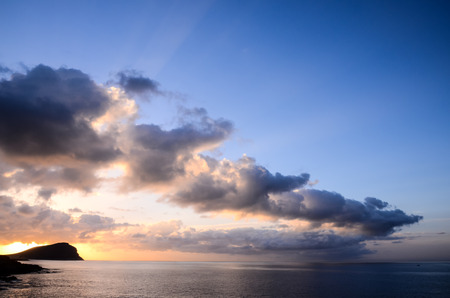 Cloudscape, Colored Clouds at Sunset near the Oceanの写真素材