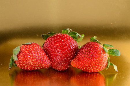 Fresh Ripe Strawberry Fruit on a Colored Backgroundの写真素材