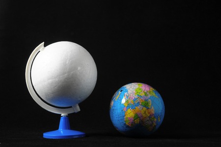 Many Globes Planet Earth on a Black Backgroundの写真素材