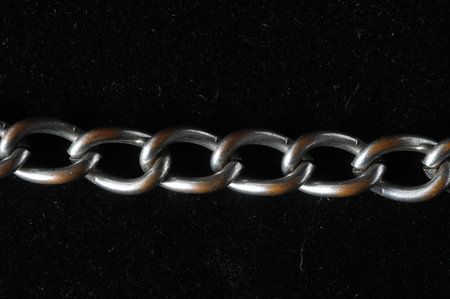 Silver Small Chain Texture on a Black Background