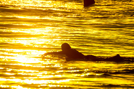 Silhouette Surfer at Sunset in Tenerife Canary Island Spainの写真素材