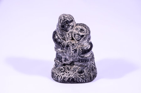 Clay Handmade Statue of a two People on White Background