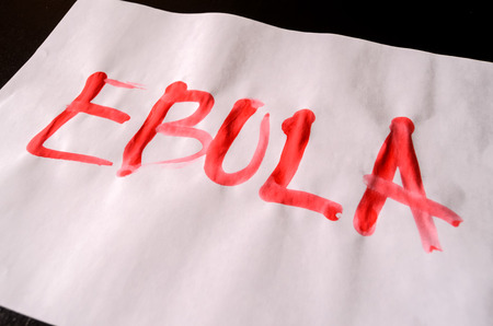 Word Ebola Text Writed with Blood on a White Paperの写真素材