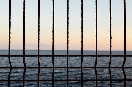 Net over the atlantic ocean at sunsetの写真素材