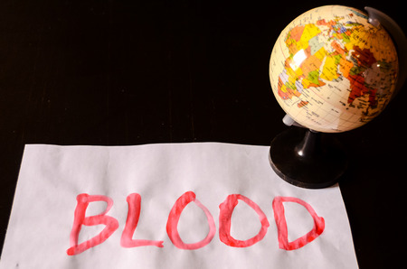 Word Blood Text Writed on a White Paperの写真素材