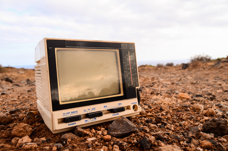 Broken Gray Television Abandoned in the Desertの写真素材