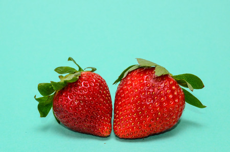 Fresh Ripe Strawberry Fruits on a Colored Backgroundの写真素材