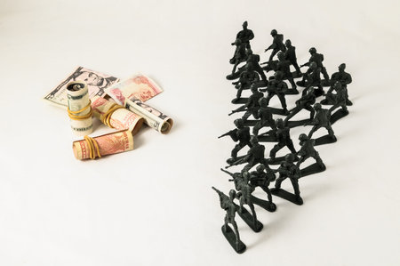 Plastic Lead Soldiers Representing War on a White Background