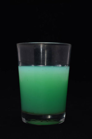 Green Liquid Glass on a Black Background
