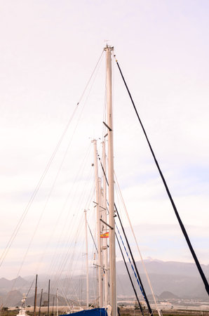 Silhouette Masts of Sail Yacht in a Marine