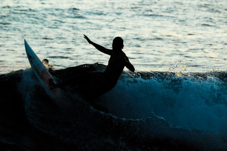 Silhouette Surfer at Sunset in Tenerife Canary Island Spain