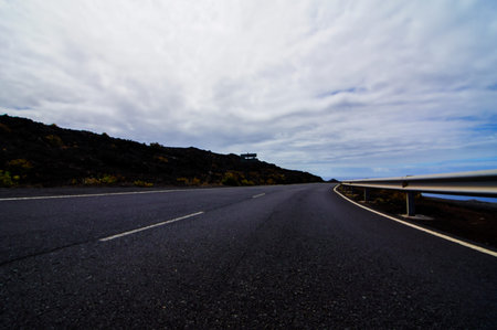 Long Empty Desert Asphalt Road in El Hierro Canary Islands Spain