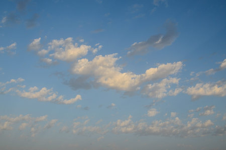 Cloudscape, Colored Clouds at Sunset near the Ocean