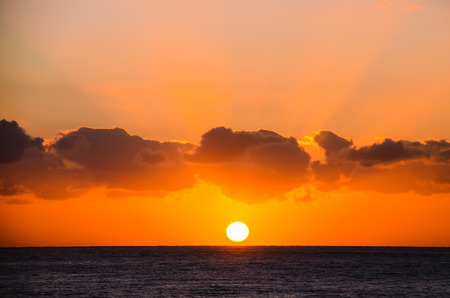 Sun Setting on the Atlantic Ocean in Tenerife Canary Island Spainの写真素材