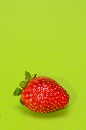 Fresh Ripe Strawberry Fruit on a Colored Backgroundの写真素材