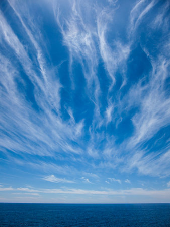 Wndy Clouds On The Evening Atlantic Ocean Sky