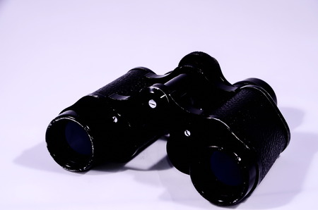 Vintage Used Black Binoculars on white backgroundの写真素材