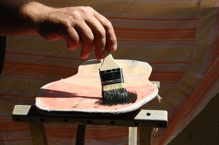Restore an Old Vintage Skateboard with Black Paintingの写真素材