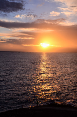 Sun Setting on the Atlantic Ocean in Tenerife Canary Island Spainの写真素材