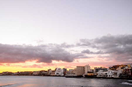 Sea and Building at Sunset in El Medano Tenerife Canary Islandsの写真素材