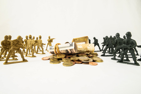 Plastic Lead Soldiers Representing War on a White Backgroundの写真素材