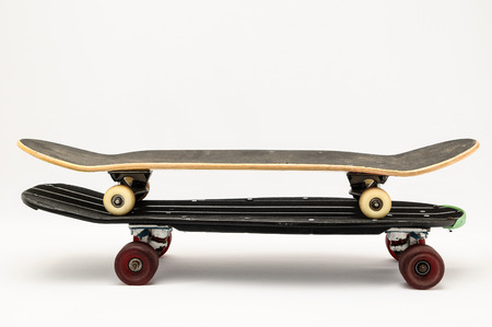 Vintage Style Black Skateboard on a white Backgroundの写真素材