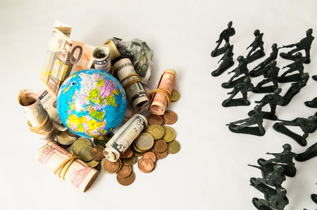 Plastic Lead Soldiers Representing War on a White Backgroundの写真素材