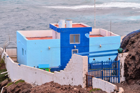 Typical Colored Colonial Spanish Building with Flat Roof