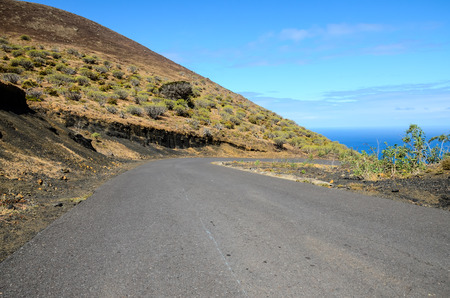 Long Empty Desert Asphalt Road in El Hierro Canary Islands Spainの写真素材
