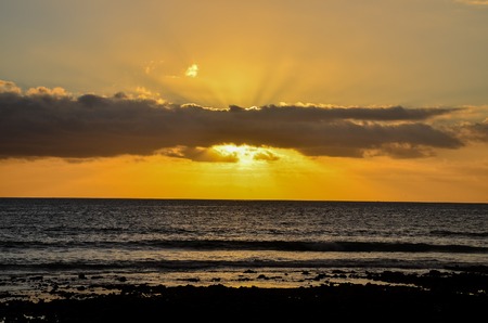 Sun Setting on the Atlantic Ocean in Tenerife Canary Island Spainの写真素材