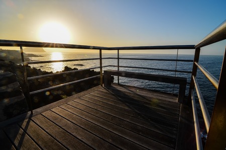 Sunrise on a Pier over Atlantic Ocean in Tenerife Canary Islands Spainの写真素材