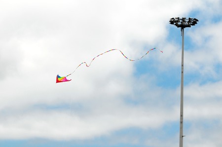 One Kite Flying over a Cloudy Sky, in Canary Islands, Spainの写真素材