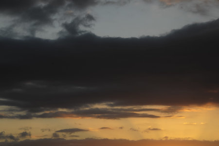 Colored Sunset Clouds Over the Atlantic Ocean in Tenerife South Spain