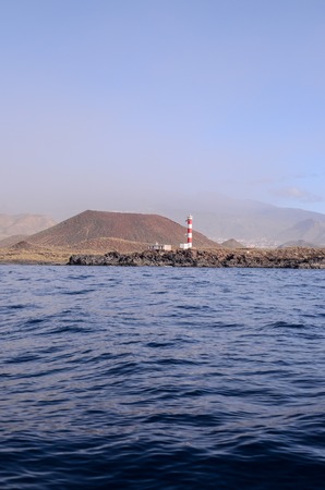 High Lighthouse near the Coast in the Canary Islandsの写真素材